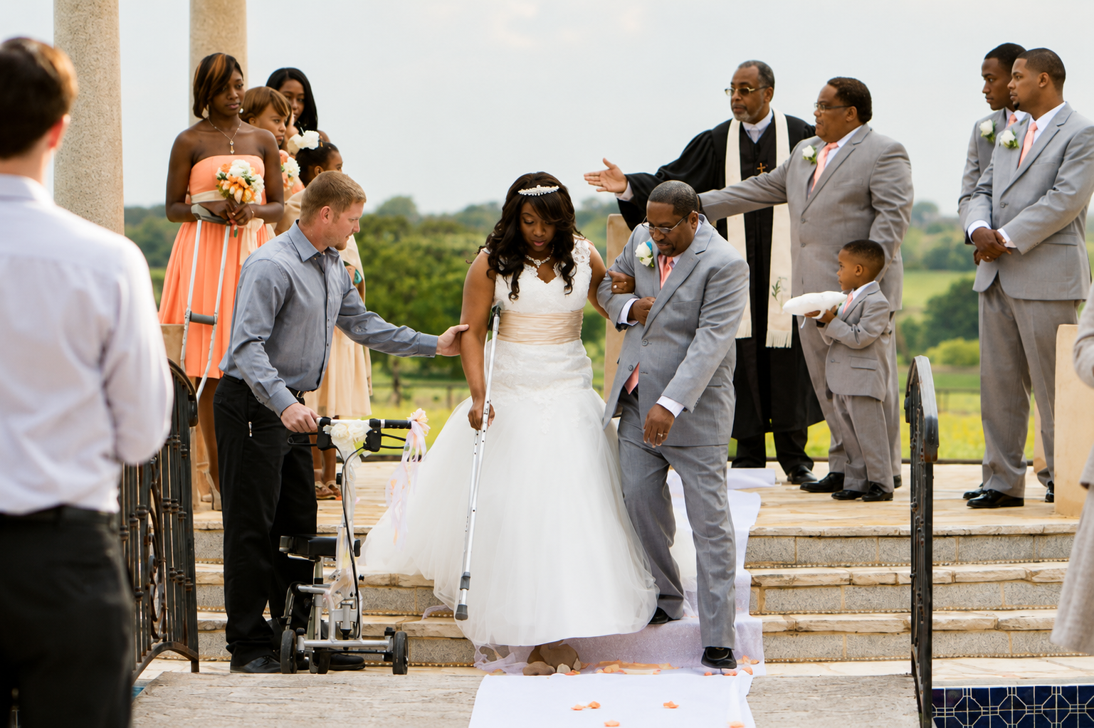 Bride walking down the aisle at outdoor wedding ceremony